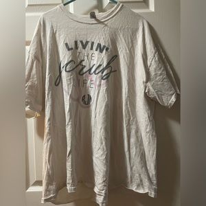 Healthcare graphic tee livin the scrub life. United Monogram brand